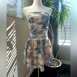 Cider strapless mini dress with Etoile print and ruffle layered skirt